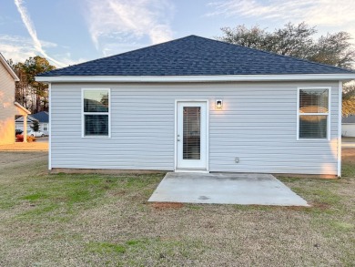 Welcome to this charming ranch style home in Clubway Commons on Players Course At Wyboo Plantation in South Carolina - for sale on GolfHomes.com, golf home, golf lot