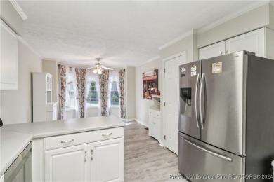 Nestled in the sought-after gated community of Carolina Trace on Carolina Trace Country Club in North Carolina - for sale on GolfHomes.com, golf home, golf lot