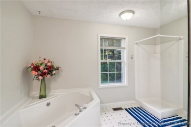 Nestled in the sought-after gated community of Carolina Trace on Carolina Trace Country Club in North Carolina - for sale on GolfHomes.com, golf home, golf lot