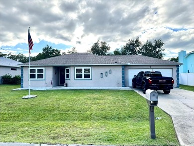 Check out this beautifully maintained home nestled in the on The Grand Club - Pine Lakes Course in Florida - for sale on GolfHomes.com, golf home, golf lot