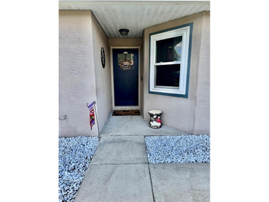 Check out this beautifully maintained home nestled in the on The Grand Club - Pine Lakes Course in Florida - for sale on GolfHomes.com, golf home, golf lot