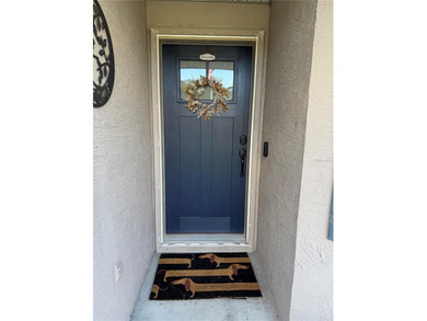 Check out this beautifully maintained home nestled in the on The Grand Club - Pine Lakes Course in Florida - for sale on GolfHomes.com, golf home, golf lot