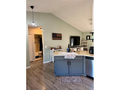 Check out this beautifully maintained home nestled in the on The Grand Club - Pine Lakes Course in Florida - for sale on GolfHomes.com, golf home, golf lot