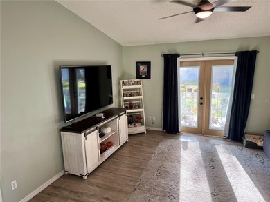 Check out this beautifully maintained home nestled in the on The Grand Club - Pine Lakes Course in Florida - for sale on GolfHomes.com, golf home, golf lot