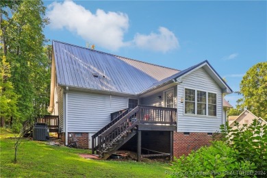 Nestled in the sought-after gated community of Carolina Trace on Carolina Trace Country Club in North Carolina - for sale on GolfHomes.com, golf home, golf lot