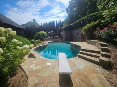 This exquisite estate in Suwanee is truly a remarkable find! on Laurel Springs Golf Club in Georgia - for sale on GolfHomes.com, golf home, golf lot