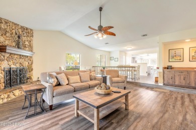 Discover this beautifully maintained 3-bed, 2-bath canal front on The Club At Pelican Bay - North Course in Florida - for sale on GolfHomes.com, golf home, golf lot