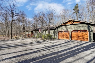 Large, contemporary ranch style home sits on a quiet cul-de-sac on Lake Naomi Timber Trails Golf Club in Pennsylvania - for sale on GolfHomes.com, golf home, golf lot