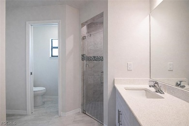 This is a MUST SEE! BRAND NEW WATERFRONT HOME WITH 4 BEDROOMS, 2 on Del Tura Golf and Country Club in Florida - for sale on GolfHomes.com, golf home, golf lot