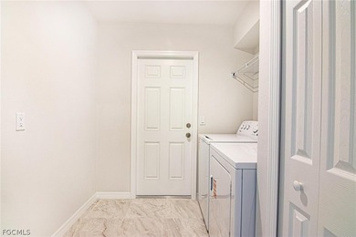 This is a MUST SEE! BRAND NEW WATERFRONT HOME WITH 4 BEDROOMS, 2 on Del Tura Golf and Country Club in Florida - for sale on GolfHomes.com, golf home, golf lot