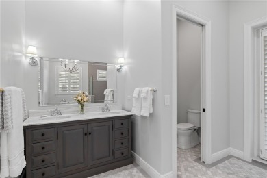 Located in desirable Grand Harbor Golf Club community on Grand Harbor Golf and Country Club in Florida - for sale on GolfHomes.com, golf home, golf lot