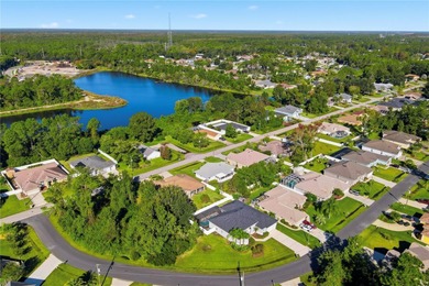 Stunning Custom Pool Home in Desirable Pine Lakes! Welcome to on The Grand Club - Pine Lakes Course in Florida - for sale on GolfHomes.com, golf home, golf lot