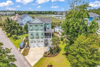 Don't miss out on this exquisite, enclosed raised beach house on Beachwood Golf Club in South Carolina - for sale on GolfHomes.com, golf home, golf lot