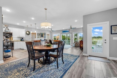 Don't miss out on this exquisite, enclosed raised beach house on Beachwood Golf Club in South Carolina - for sale on GolfHomes.com, golf home, golf lot