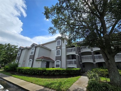 This stunning two-bedroom two-bathroom, third-floor, corner unit on Hunters Creek Golf Course in Florida - for sale on GolfHomes.com, golf home, golf lot