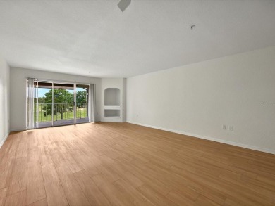 This stunning two-bedroom two-bathroom, third-floor, corner unit on Hunters Creek Golf Course in Florida - for sale on GolfHomes.com, golf home, golf lot