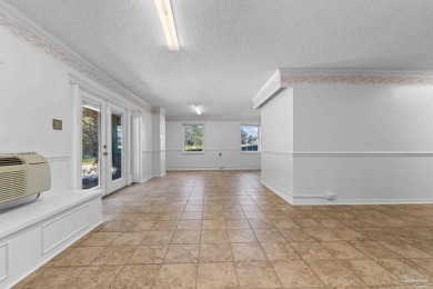 Set on a .42 acre cul-de-sac lot overlooking the Scenic Hills on Scenic Hills Country Club in Florida - for sale on GolfHomes.com, golf home, golf lot