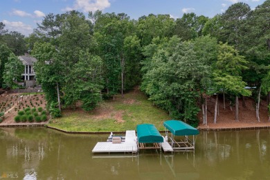Private lake lot located in Parrotts Cove gives easy access to on Reynolds Lake Oconee - The National  in Georgia - for sale on GolfHomes.com, golf home, golf lot