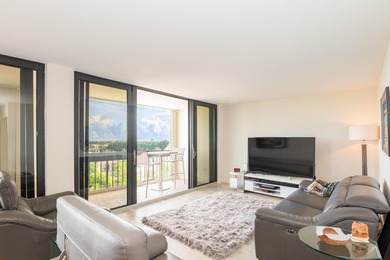 Beautifully updated open 3 bedroom 2 bath corner unit with floor on The President Country Club in Florida - for sale on GolfHomes.com, golf home, golf lot