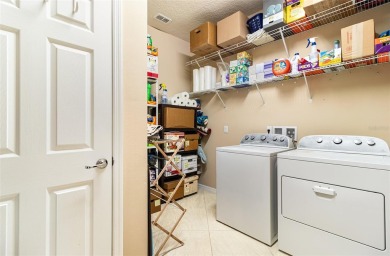 Exceptional Summerwood Model in Del Webb Orlando!  Meticulously on Ridgewood Lakes Golf and Country Club in Florida - for sale on GolfHomes.com, golf home, golf lot
