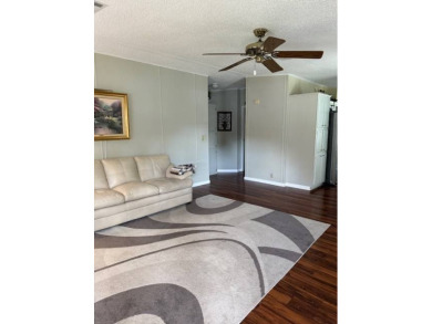**Manufactured Home on Leased Land**         Don't miss out on on Whisperwood Golf Course in Florida - for sale on GolfHomes.com, golf home, golf lot
