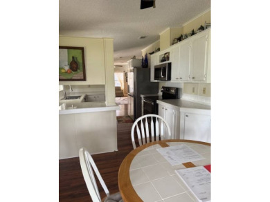 **Manufactured Home on Leased Land**         Don't miss out on on Whisperwood Golf Course in Florida - for sale on GolfHomes.com, golf home, golf lot