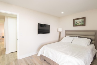 Beautifully updated open 3 bedroom 2 bath corner unit with floor on The President Country Club in Florida - for sale on GolfHomes.com, golf home, golf lot