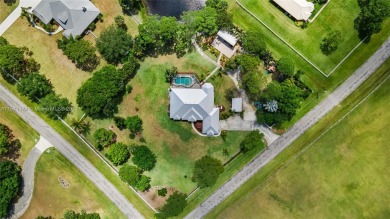 Situated on 2 beautifully landscaped acres in Stuart on The Fox Club in Florida - for sale on GolfHomes.com, golf home, golf lot