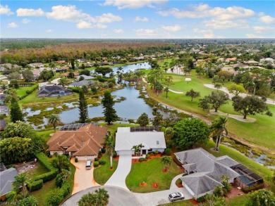 Wake up to serene lake and golf course views in this beautifully on Royal Palm Golf Club in Florida - for sale on GolfHomes.com, golf home, golf lot