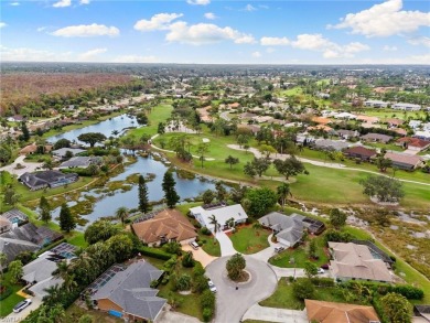 Wake up to serene lake and golf course views in this beautifully on Royal Palm Golf Club in Florida - for sale on GolfHomes.com, golf home, golf lot