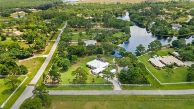 Situated on 2 beautifully landscaped acres in Stuart on The Fox Club in Florida - for sale on GolfHomes.com, golf home, golf lot