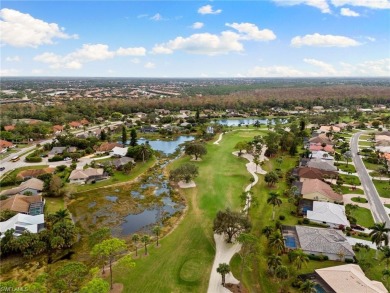 Wake up to serene lake and golf course views in this beautifully on Royal Palm Golf Club in Florida - for sale on GolfHomes.com, golf home, golf lot