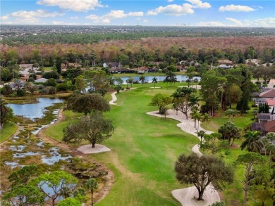 Wake up to serene lake and golf course views in this beautifully on Royal Palm Golf Club in Florida - for sale on GolfHomes.com, golf home, golf lot