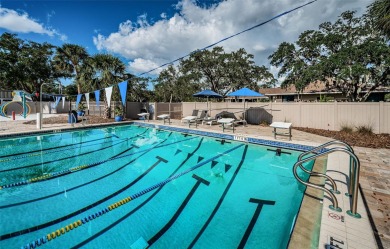 One or more photo(s) has been virtually staged. East Lake on East Lake Woodlands Country Club in Florida - for sale on GolfHomes.com, golf home, golf lot
