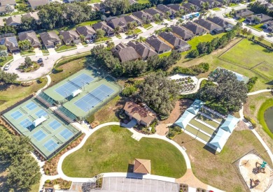 Exceptional Summerwood Model in Del Webb Orlando!  Meticulously on Ridgewood Lakes Golf and Country Club in Florida - for sale on GolfHomes.com, golf home, golf lot