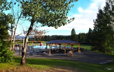 Discover serene living on this stunning, level lot nestled along on Meadowcreek Golf Resort in Idaho - for sale on GolfHomes.com, golf home, golf lot