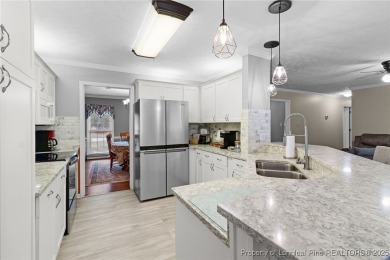 Welcome to this beautifully maintained brick ranch-style home on Baywood Golf Club in North Carolina - for sale on GolfHomes.com, golf home, golf lot