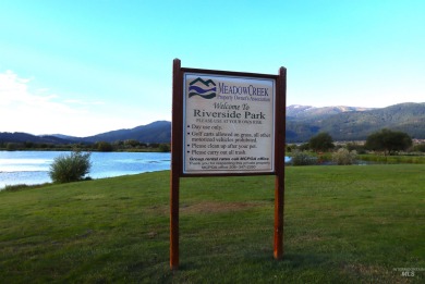 Discover serene living on this stunning, level lot nestled along on Meadowcreek Golf Resort in Idaho - for sale on GolfHomes.com, golf home, golf lot