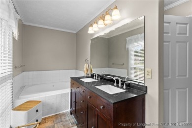 Welcome to this beautifully maintained brick ranch-style home on Baywood Golf Club in North Carolina - for sale on GolfHomes.com, golf home, golf lot