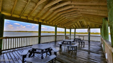 Nestled in the heart of Ponce Inlet, this luxurious condo on Harbour Village Golf and Yacht Club in Florida - for sale on GolfHomes.com, golf home, golf lot