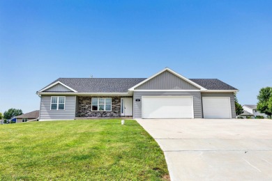 Welcome to this 3-bedroom, 2-bath home in Luxemburg, built in on NorthBrook Country Club in Wisconsin - for sale on GolfHomes.com, golf home, golf lot