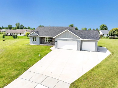 Welcome to this 3-bedroom, 2-bath home in Luxemburg, built in on NorthBrook Country Club in Wisconsin - for sale on GolfHomes.com, golf home, golf lot