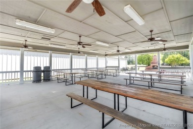 Welcome to this beautifully maintained brick ranch-style home on Baywood Golf Club in North Carolina - for sale on GolfHomes.com, golf home, golf lot