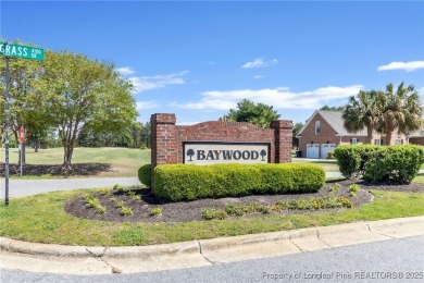 Welcome to this beautifully maintained brick ranch-style home on Baywood Golf Club in North Carolina - for sale on GolfHomes.com, golf home, golf lot