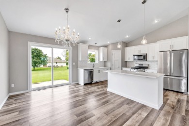 Welcome to this 3-bedroom, 2-bath home in Luxemburg, built in on NorthBrook Country Club in Wisconsin - for sale on GolfHomes.com, golf home, golf lot