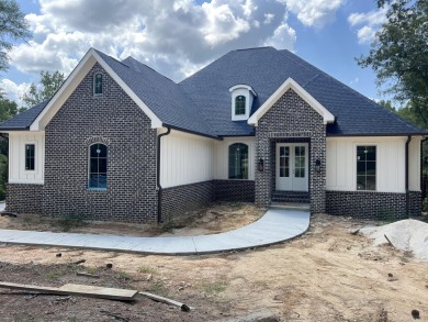 Golf course frontage for this stunning 3 car garage home with an on The Golf Club At Cedar Creek in South Carolina - for sale on GolfHomes.com, golf home, golf lot