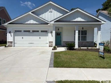 This beautiful 4-bedroom, 2-bathroom home is located in the on Surf Golf and Beach Club in South Carolina - for sale on GolfHomes.com, golf home, golf lot