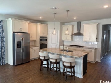 This beautiful 4-bedroom, 2-bathroom home is located in the on Surf Golf and Beach Club in South Carolina - for sale on GolfHomes.com, golf home, golf lot