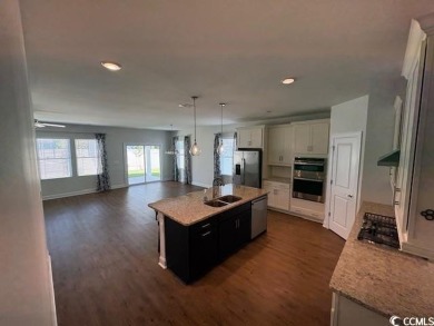 This beautiful 4-bedroom, 2-bathroom home is located in the on Surf Golf and Beach Club in South Carolina - for sale on GolfHomes.com, golf home, golf lot