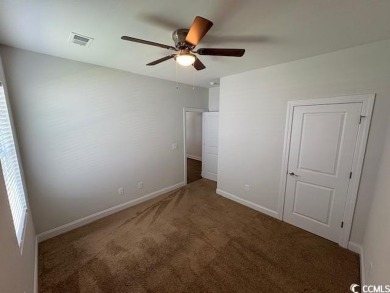 This beautiful 4-bedroom, 2-bathroom home is located in the on Surf Golf and Beach Club in South Carolina - for sale on GolfHomes.com, golf home, golf lot